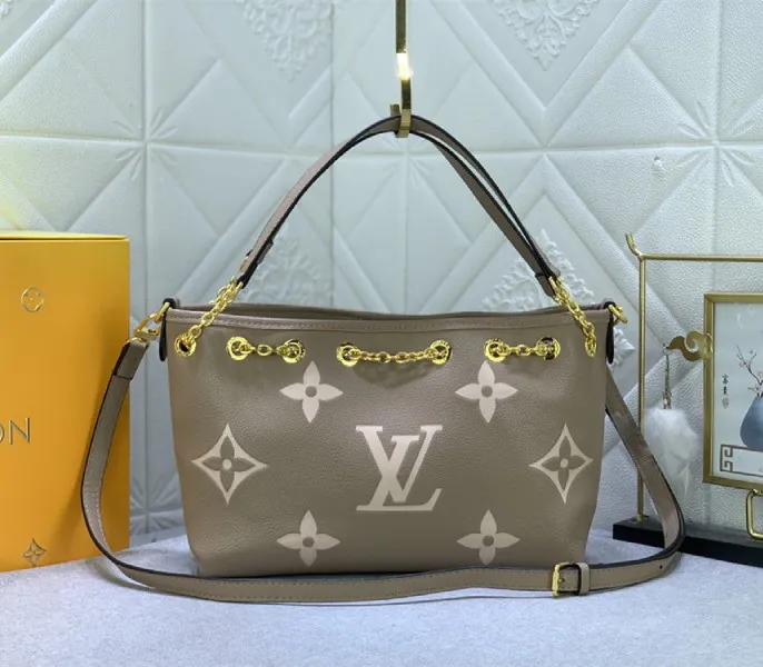 Louis Vuitton Bicolor Monogram Empreinte Bundle Bag In Tourterelle Gray and Cream